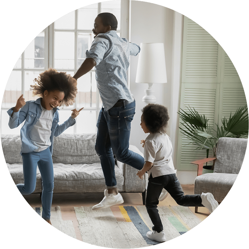 Family dancing in living room