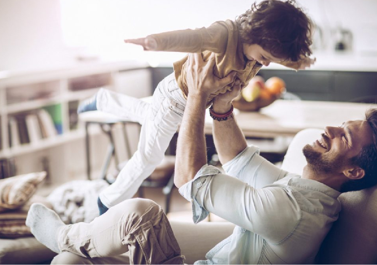 Man and his kid playing