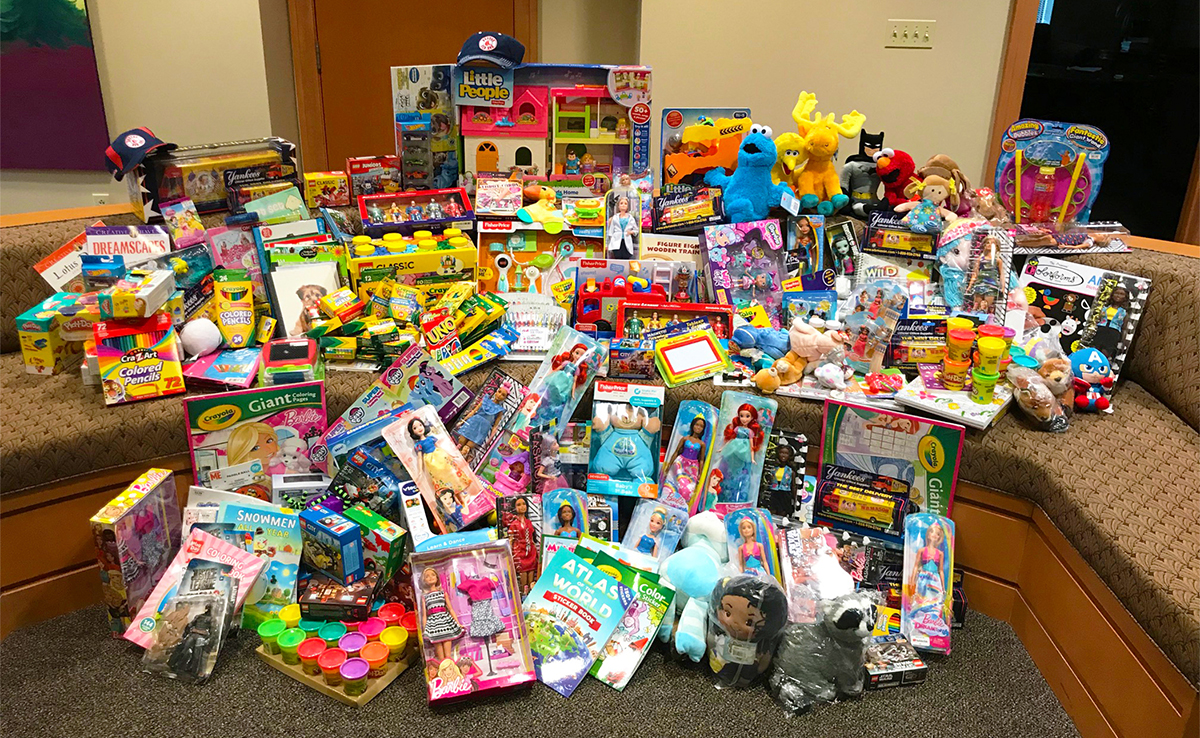 Group photo of many toys donated 